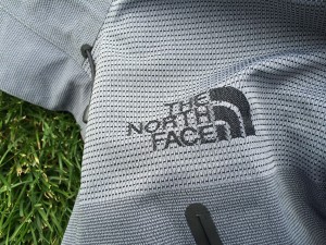 North Face logo woven into the reinforced shoulder panel